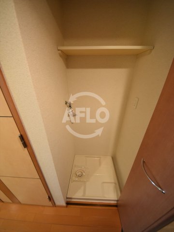 その他設備　プレサンス本町リアルシティ　洗濯機置場