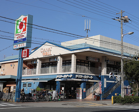 スーパー　デイリーカナートイズミヤ南田辺店（スーパー）まで592m