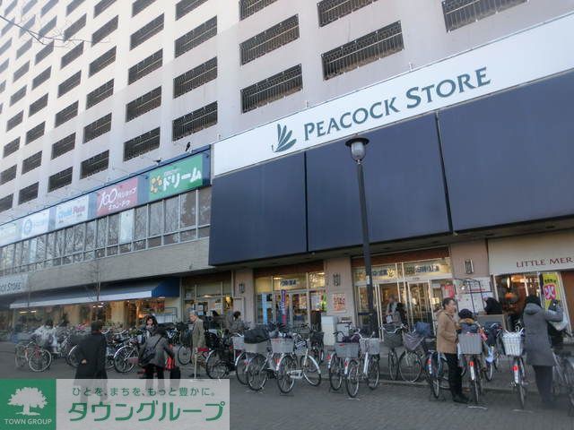 コンビニ　ピーコックストア（コンビニ）まで240m