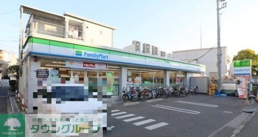 コンビニ　ファミリーマート摂津正雀駅前店（コンビニ）まで210m