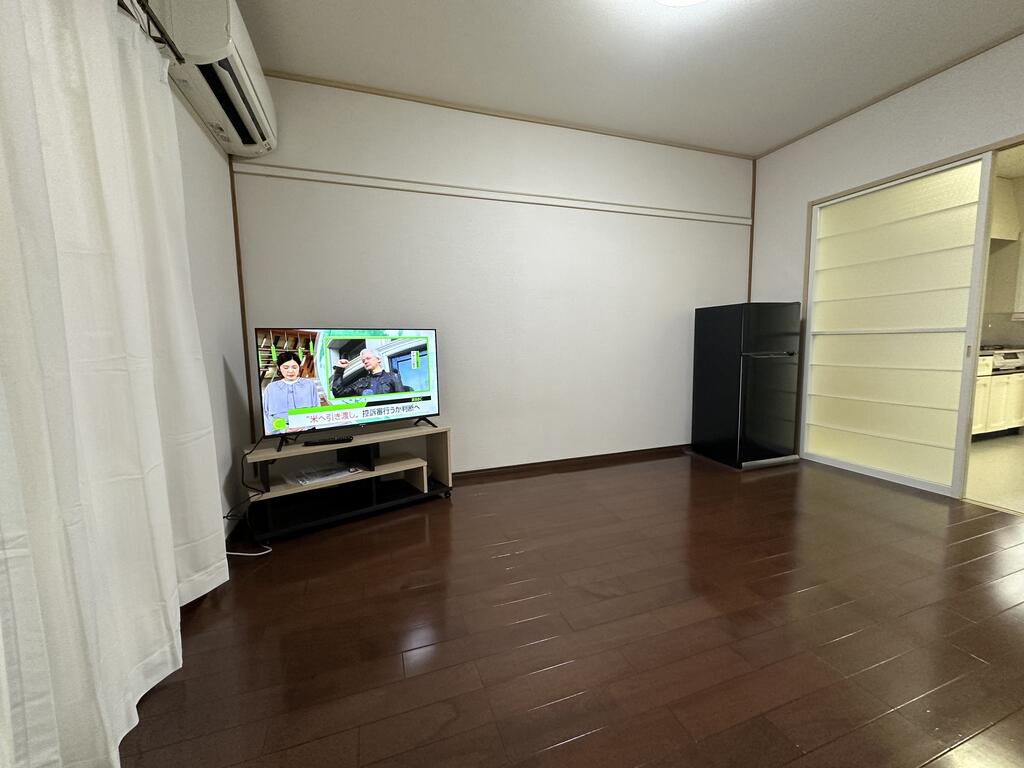 サンハイツC 家電付の居間写真