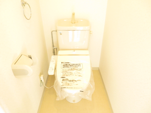 広島市佐伯区 10階建 築29年のトイレ写真