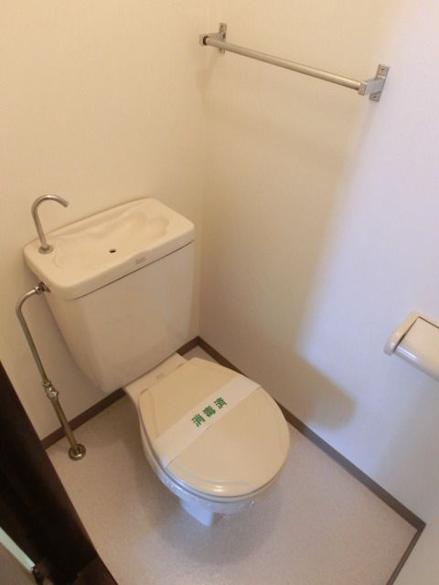 トイレ　※同タイプ住戸参考写真　現況優先