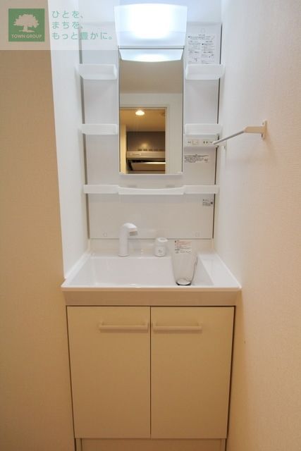 洗面設備　同施工会社同タイプ　の別建物写真になります。