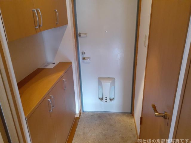 コンフォート鴻之台の玄関写真