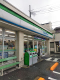 コンビニ　ファミリーマート 中野白鷺店（コンビニ）まで64m