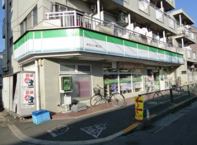 コンビニ　ファミリーマートまるいし八幡山店（コンビニ）まで62m