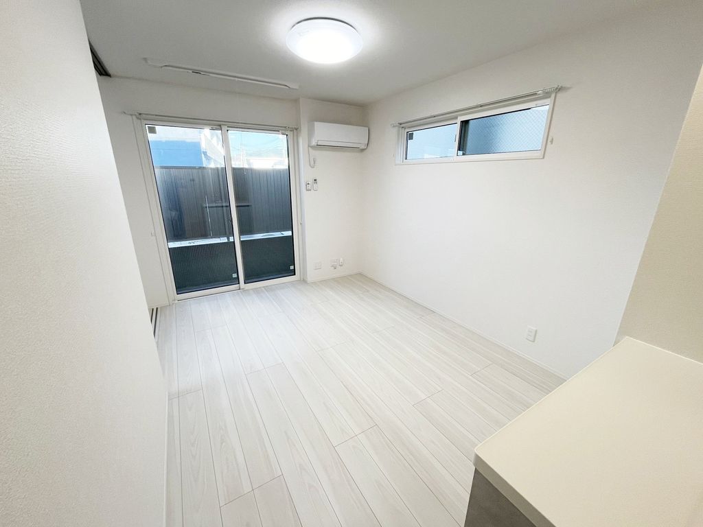 トリシア博多麦野 壱番館の居間写真