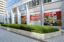 スーパー　ピーコックストア西梅田店（スーパー）まで428m