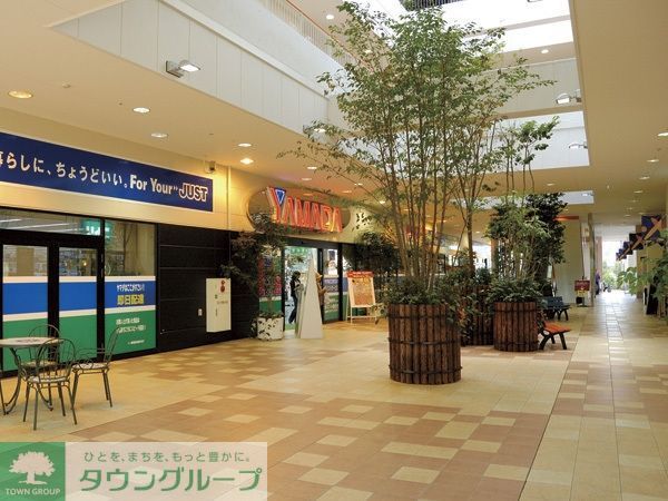 ショッピングセンター　クロスガーデン多摩（ショッピングセンター）まで1100m