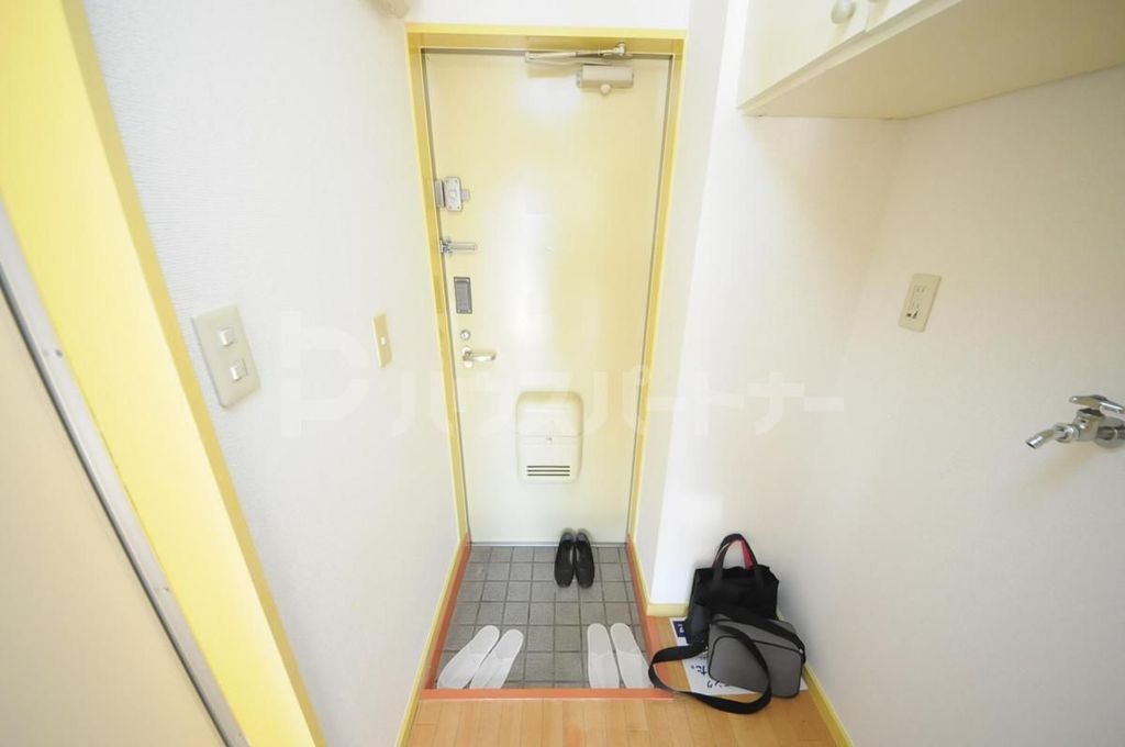 ジュネパレス新柏A棟の玄関写真