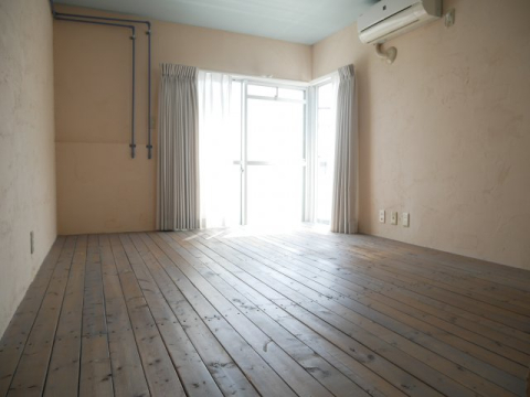 コア神明の居間写真