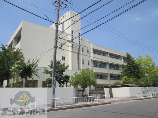 中学校　四條畷市立四條畷西中学校（中学校）まで446m