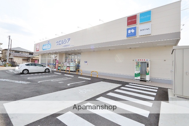 ドラックストア　ウエルシア小松島横須店（ドラッグストア）まで1070m