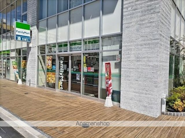 コンビニ　ファミリーマート（コンビニ）まで710m