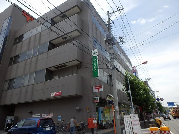 郵便局　登戸郵便局（郵便局）まで338m