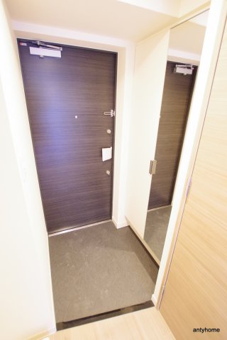 プレサンス OSAKA DOMECITY クロスティの玄関写真