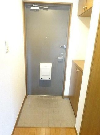ＪＲ高崎線 尾久駅 徒歩4分 7階建 築26年の玄関写真