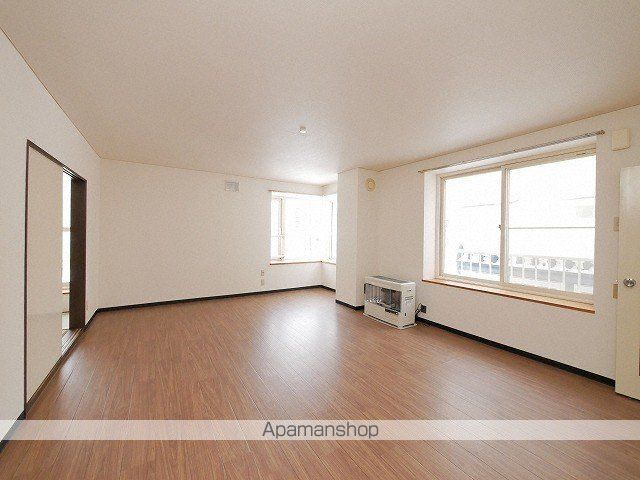 札幌市白石区 2階建 築38年の居間写真