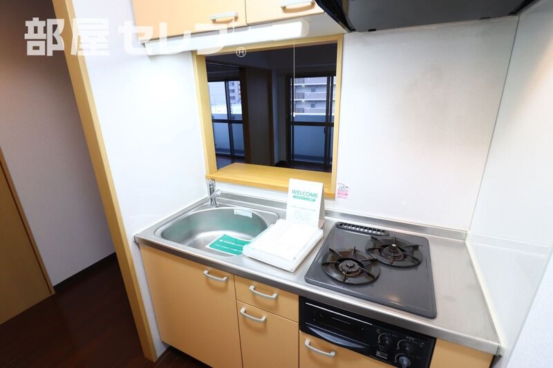 キッチン　扉を開ければ一つの広いお部屋としても使えます