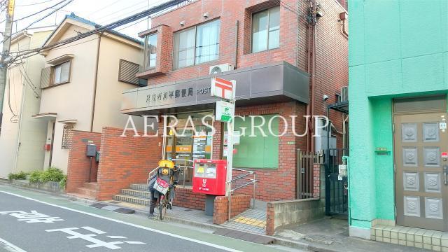 郵便局　足立西加平郵便局（郵便局）まで574m