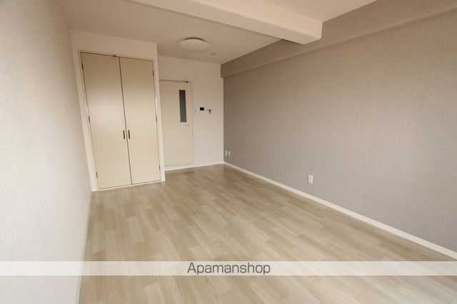 弘麗牧マンションの居間写真