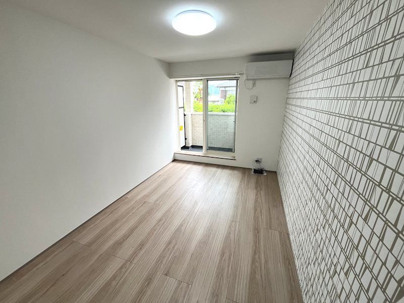 ヒルズ新羽町の居間写真