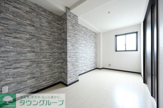 Comfort南千住の居間写真