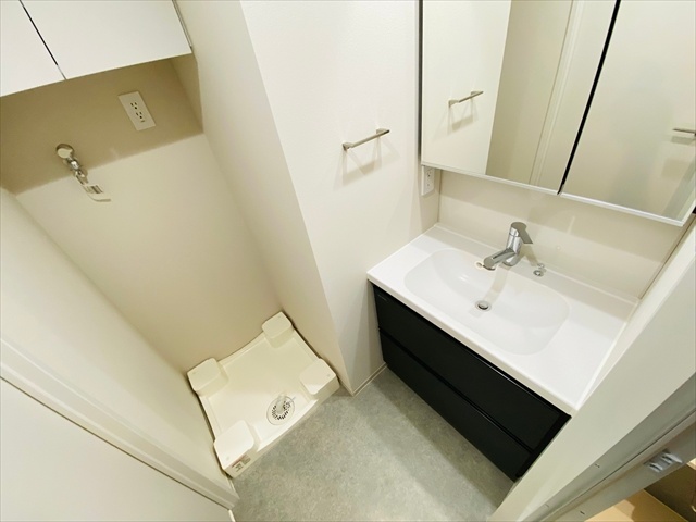 洗面設備　同一建物内７０１号室内装写真転載