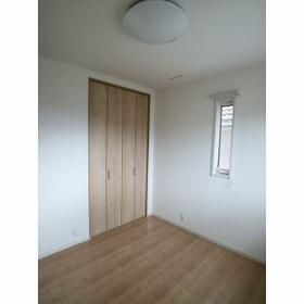 新津町399-11一戸建の居間写真