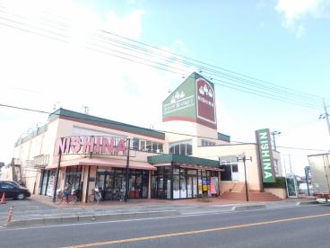 スーパー　ニシナフードバスケット西阿知店（スーパー）まで620m