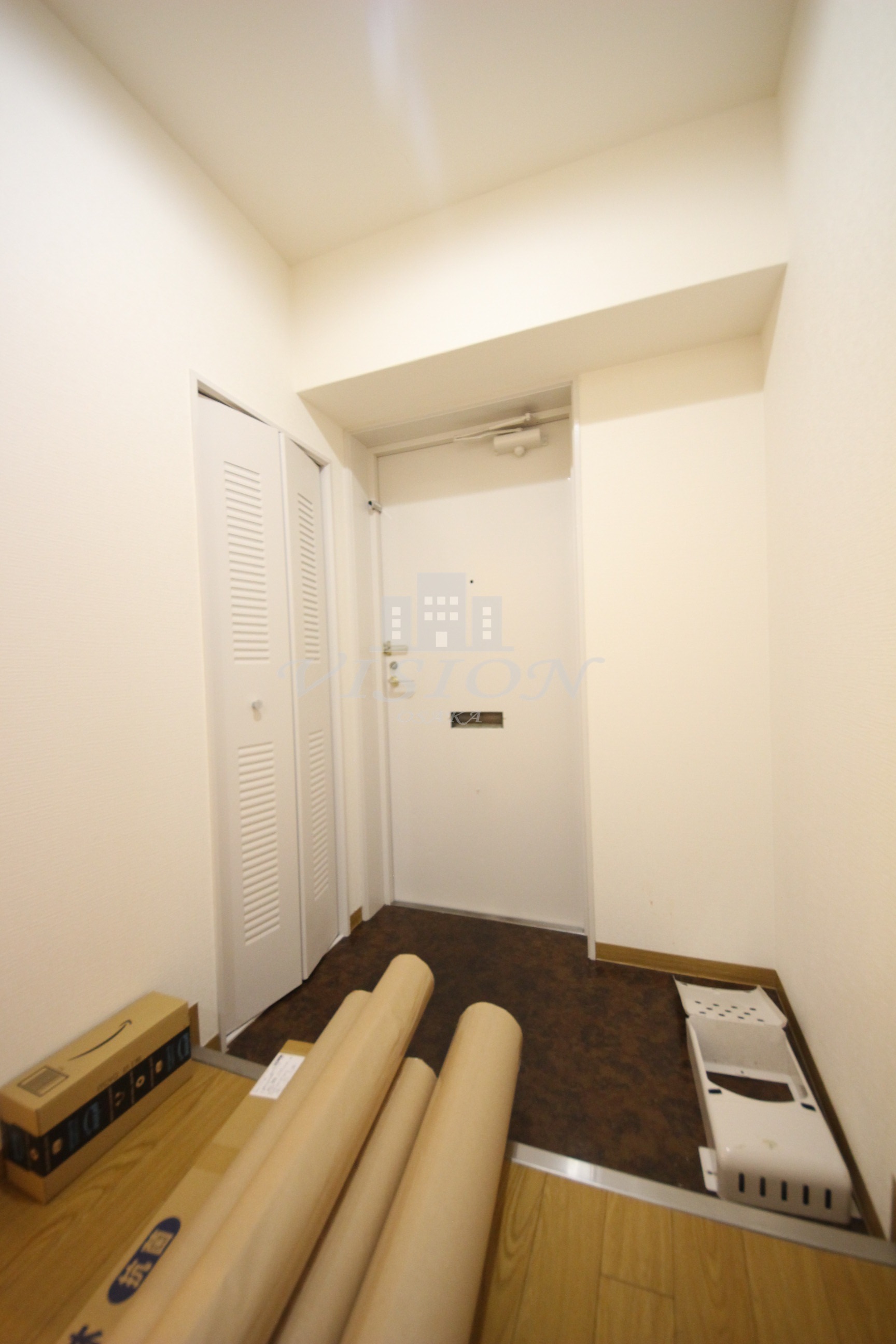 玄関　写真は別室のものです