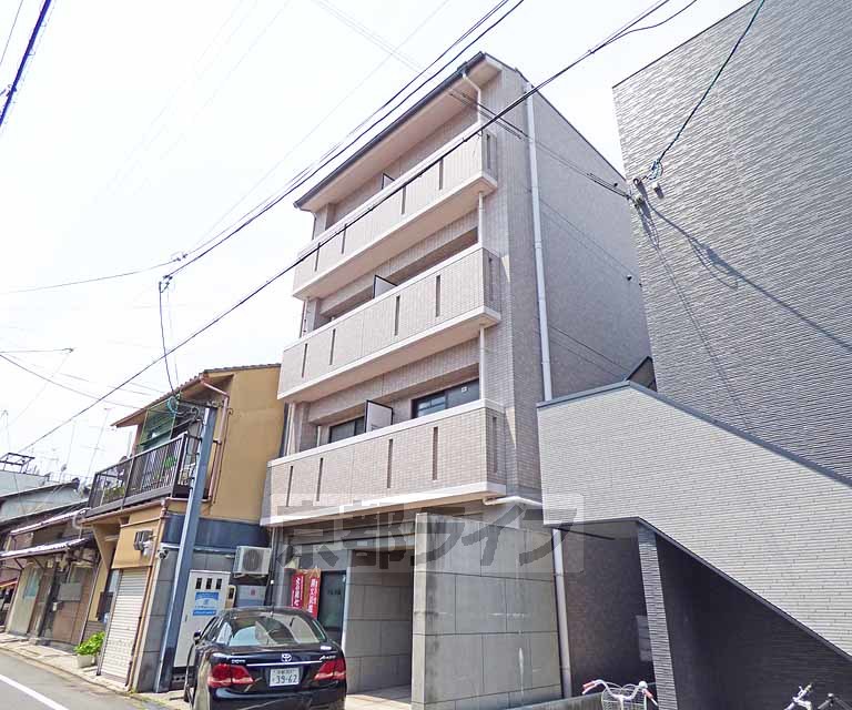 京都市北区紫竹牛若町のマンションの建物外観