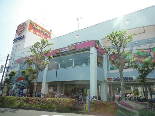 スーパー　三和（スーパー）まで659m