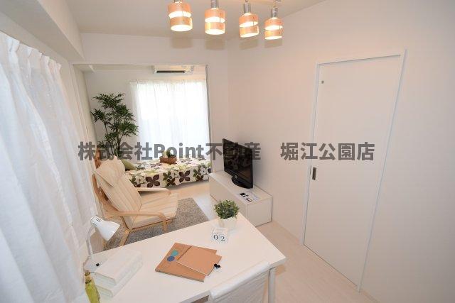 地下鉄長堀鶴見緑地線 西長堀駅 徒歩6分 10階建 築11年の居間写真