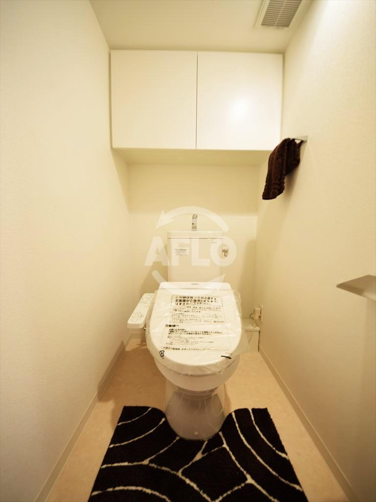 トイレ　パークアクシス本町　温水洗浄便座