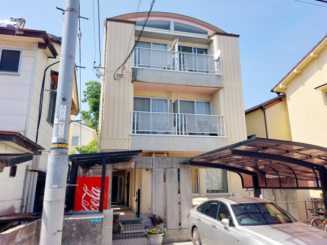 松山市祇園町のマンションの建物外観