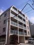 建物外観　総タイル貼りの重厚感あふれる外観