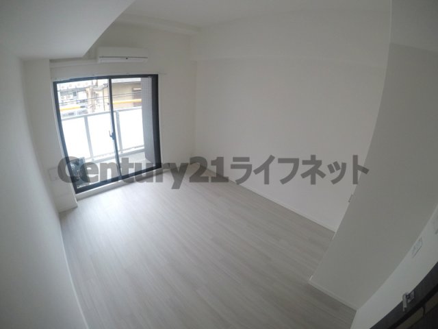 地下鉄御堂筋線 西中島南方駅 徒歩6分 10階建 築8年の居間写真