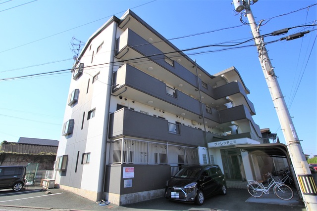 松山市上野町のマンションの建物外観