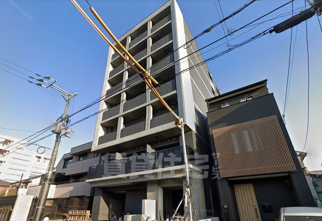 【京都市南区東九条西札辻町のマンションの建物外観】