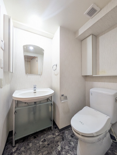 洗面設備　※クリーニング前の写真です