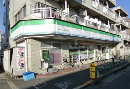 コンビニ　ファミリーマートまるいし八幡山店（コンビニ）まで395m