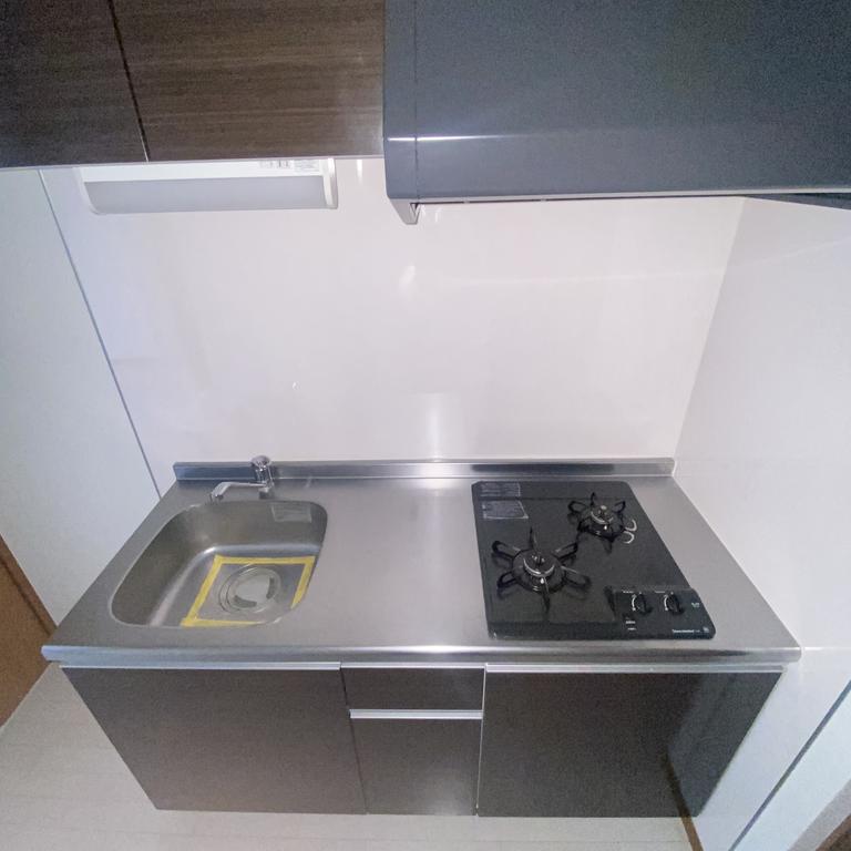 キッチン　※写真は別号室のものになりますので現状優先とさせていただきま