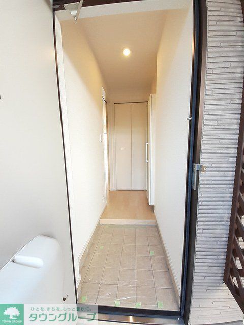 プラシードアルバVの玄関写真