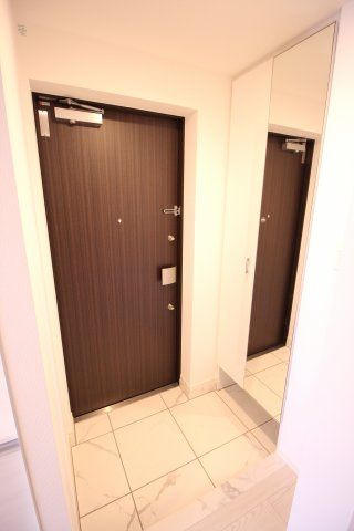 玄関　クレイシアＩＤＺ王子マークプレイス　北区王子2