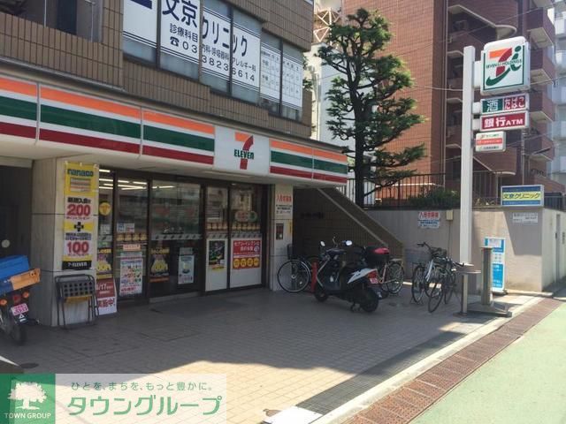 コンビニ　セブンイレブン文京千駄木1丁目店（コンビニ）まで490m