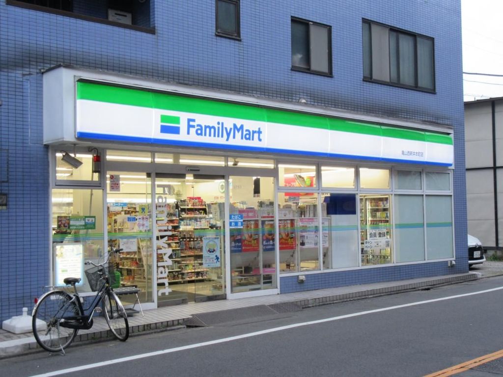 コンビニ　ファミリーマート亀山西新井本町店（コンビニ）まで410m