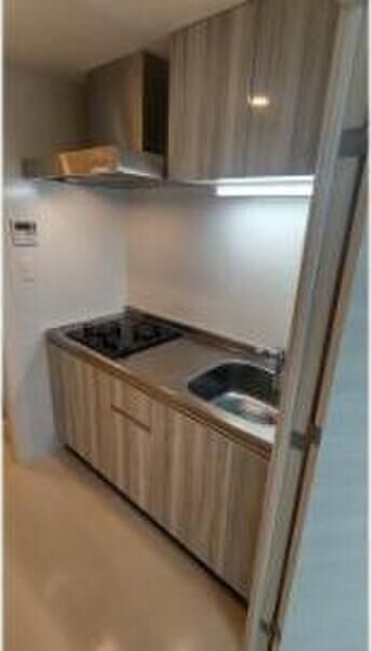キッチン　※写真は同じマンションの違う部屋のものになります。