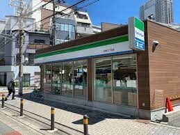 コンビニ　ファミリーマート中津三丁目店（コンビニ）まで387m
